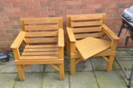 A PAIR OF MODERN GARDEN CHAIRS with angled centre shelf (unfitted)