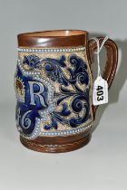 A DOULTON LAMBETH COMMEMORATIVE JUG FOR CHARLES I, incised and relief faux leather and foliate