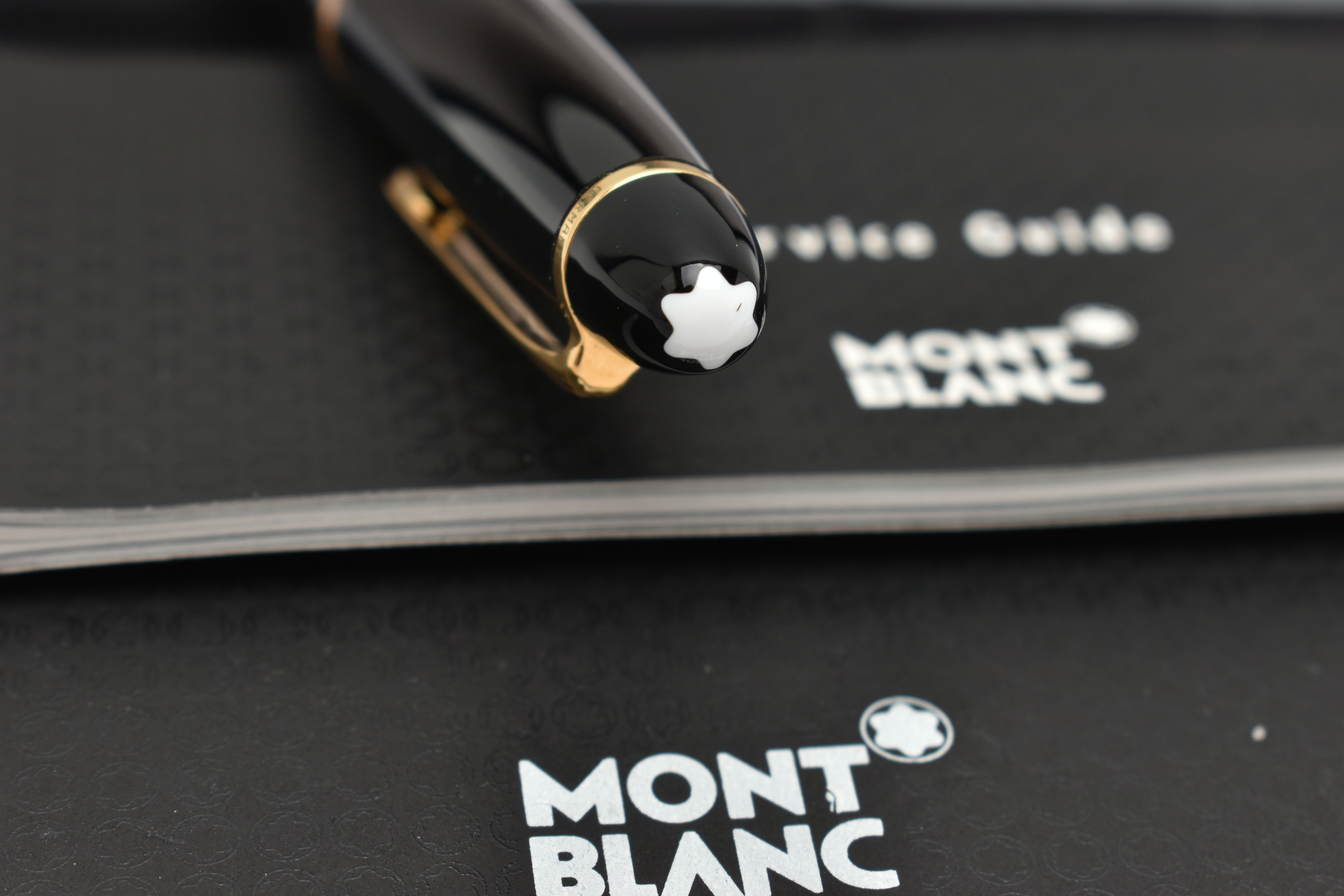 A CASED MONT BLANC MEISTERSTUCK RETRACTABLE PENCIL, the black pen case with gold coloured trim, - Image 4 of 4