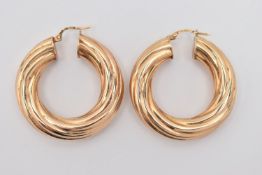 A PAIR OF 9CT GOLD LARGE HOOP EARRINGS, yellow gold hoops with lever fittings, approximate length