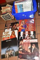 A BOX OF LPS AND A VINTAGE RACK OF MID-CENTURY SINGLE RECORDS, to include thirty four LPs to include