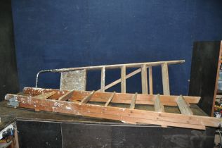 TWO VINTAGE WOODEN STEP LADDERS the longest being 200cm long the other 177cm with tubular steel