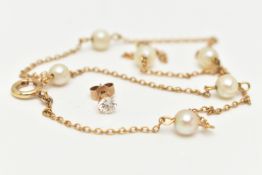 A YELLOW METAL AND CULTURED PEARL STATION NECKLACE, six cultured pearls, approximate diameter 6mm,