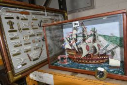 A GROUP OF NAUTICAL THEMED ITEMS, comprising a model of 'The Mary Rose' in a wooden framed glazed