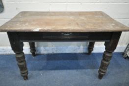 A VICTORIAN PINE SIDE TABLE, with a single drawer, on turned legs, width 117cm x depth 68cm x height