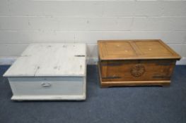 A PAINTED DOUBLE STORAGE CHEST, width 92cm x depth 88cm x height 43cm, and a corona pine blanket