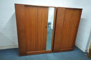 AN AUSTINSUITE MID CENTURY TEAK WARDROBE, with a single tambour sliding door and mirror, width 122cm