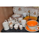 A LARGE SUSIE COOPER PRODUCTION CUP AND SAUCER, orange and brown banded, printed backstamp 'A