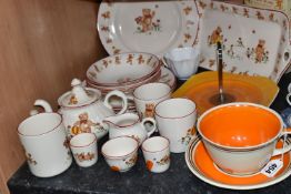 A LARGE SUSIE COOPER PRODUCTION CUP AND SAUCER, orange and brown banded, printed backstamp 'A