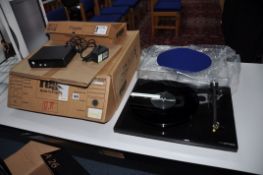 A REGA RP6 TURNTABLE with power supply, controller and original packaging Condition Report looks