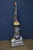 A DYSON DC27 ANIMAL UPRIGHT VACUUM CLEANER (PAT pass and working)