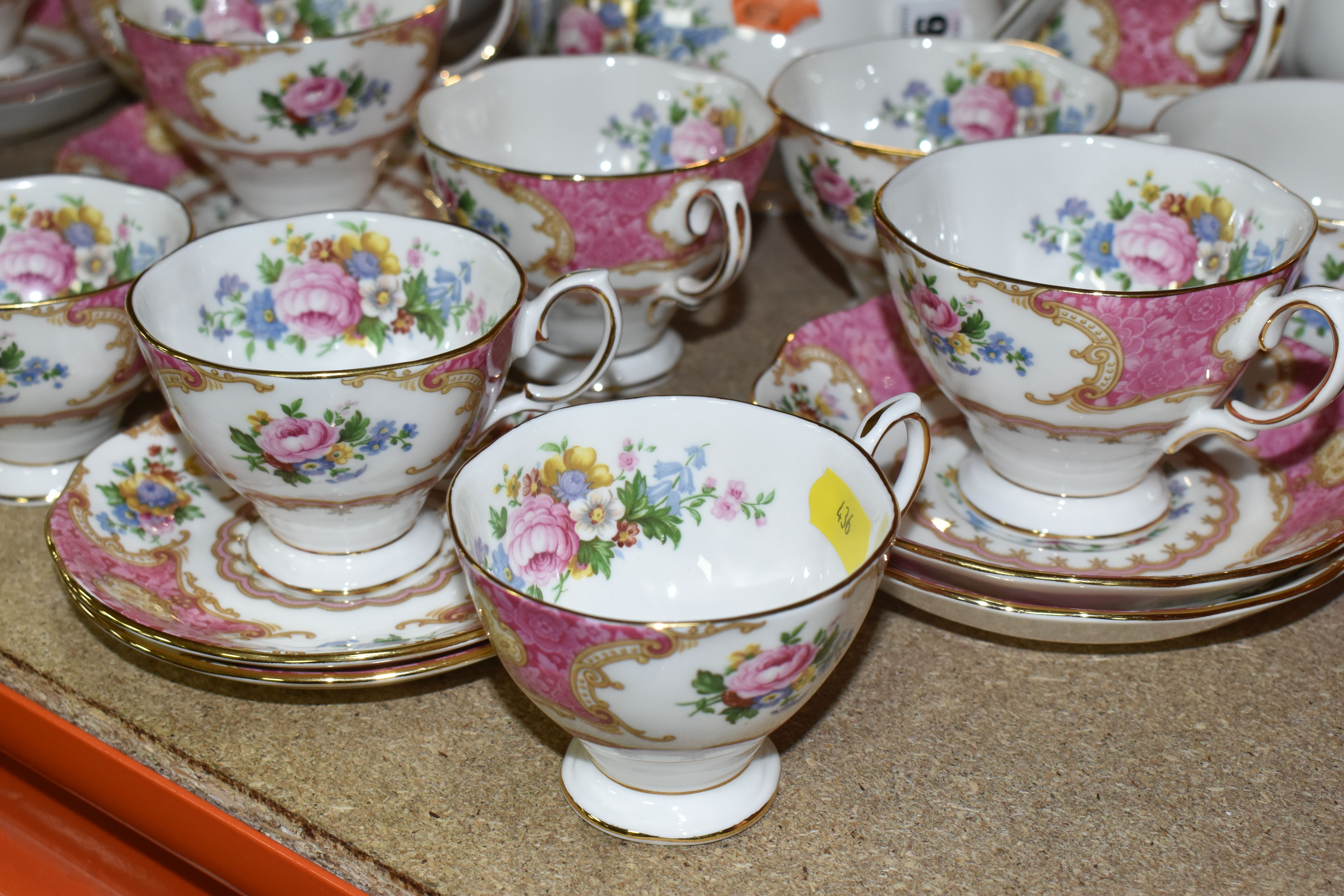 A ROYAL ALBERT 'LADY CARLYLE' SIX PLACE PART DINNER SERVICE, comprising tea cups and saucers, coffee - Image 7 of 9