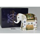 A BOXED ROYAL CROWN DERBY 'INDIAN ELEPHANT INFANT' PAPERWEIGHT, gold stopper, height 7.5cm