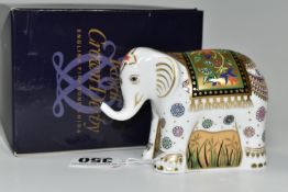 A BOXED ROYAL CROWN DERBY 'INDIAN ELEPHANT INFANT' PAPERWEIGHT, gold stopper, height 7.5cm