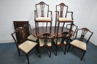 A 20TH CENTURY MAHOGANY OVAL TWIN PEDESTAL DINING TABLE, with one additional leaf, length 162cm x