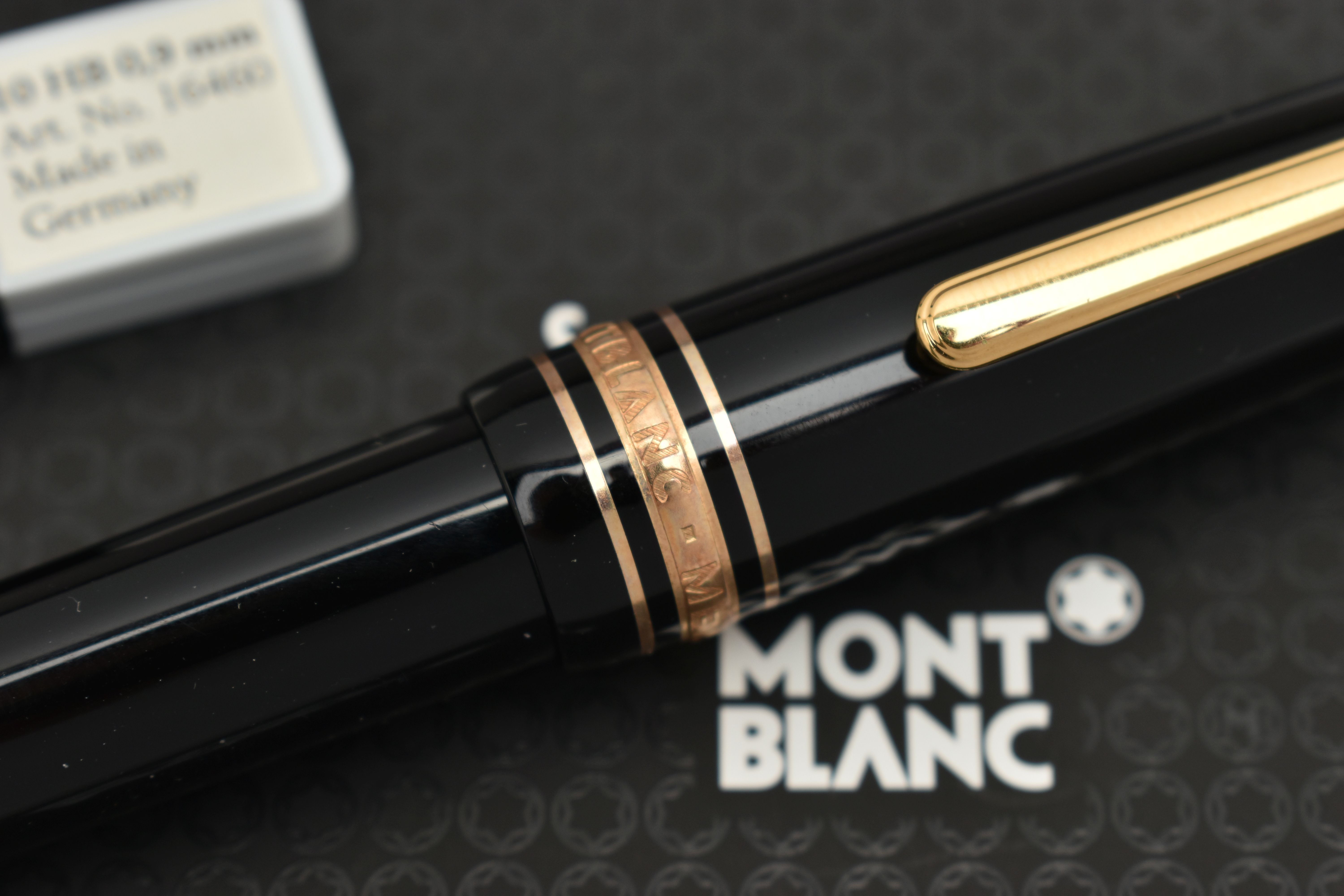 A CASED MONT BLANC MEISTERSTUCK RETRACTABLE PENCIL, the black pen case with gold coloured trim, - Image 3 of 4