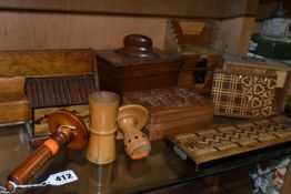 A COLLECTION OF TREEN, comprising two darning mushrooms, a needle case (missing lid and split), an