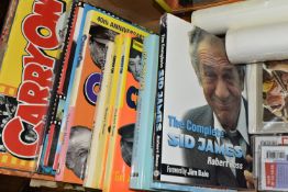 A COLLECTION OF CARRY ON FILM MEMORABILIA, books, postcards, cassette tapes, calendars, diecast