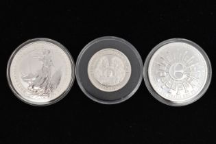 A PARCEL OF SILVER COINS, to include a 2002 Silver Britannia One Ounce £2 coin, a 2006 for Tristan