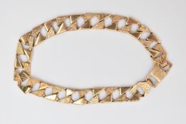 A 9CT GOLD CURB LINK BRACELET, approximate width 8.2mm, square alternating textured and polished
