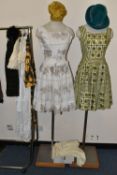 A COLLECTION OF EARLY 20TH CENTURY BABY CLOTHES AND MID TWENTIETH CENTURY DRESSES, comprising