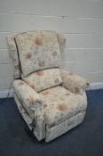 A REPOSE FLORAL UPHOLSTERED ELECTRIC RISE AND RECLINE ARMCHAIR (condition report: PAT pass and