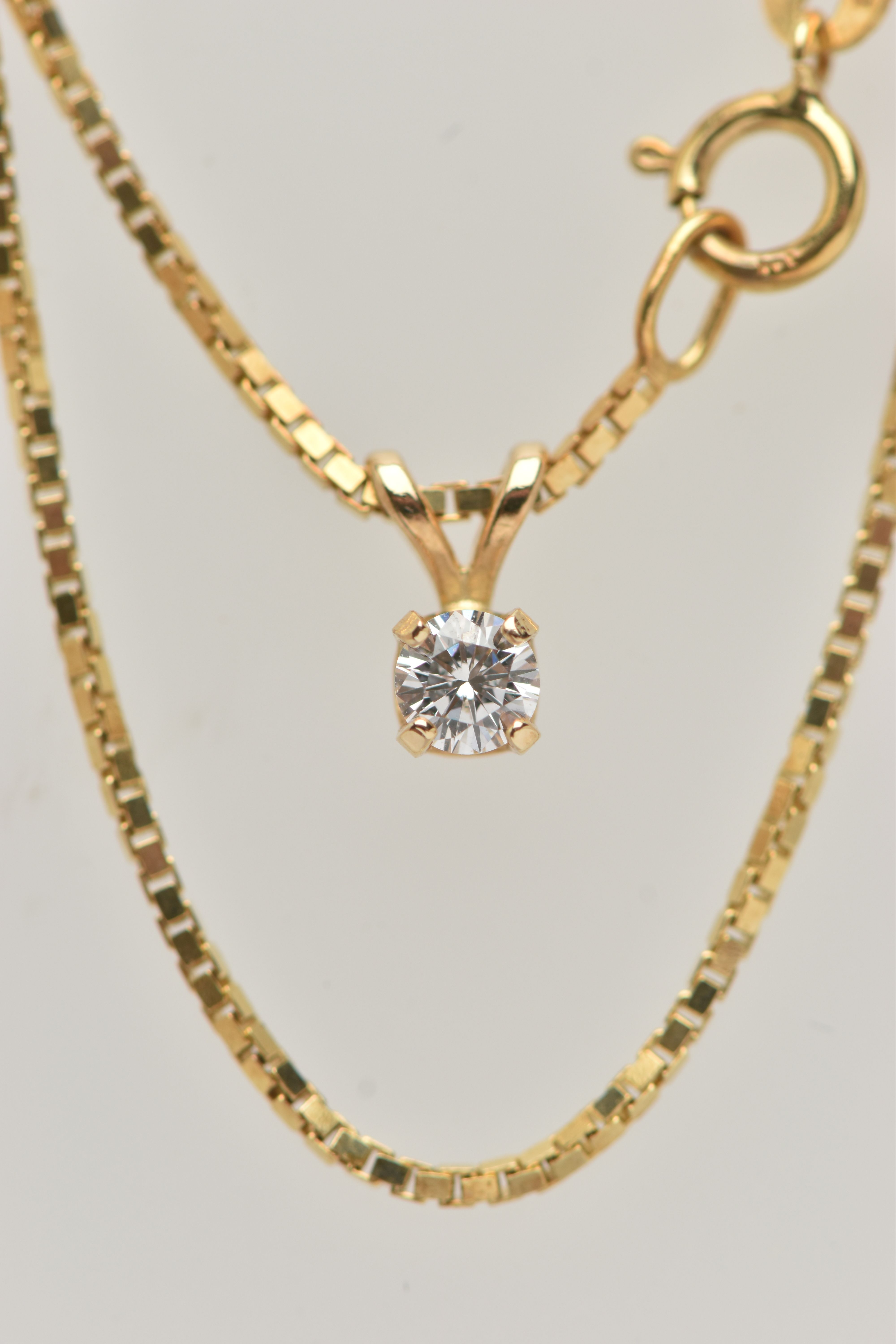 A DIAMOND SINGLE STONE PENDANT WITH YELLOW METAL CHAIN, the pendant set with a round brilliant cut - Image 2 of 4