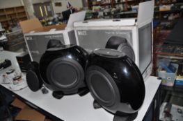 A PAIR OF KEF HTB2SE POWERED SUBS in original packaging, a pair of similar KEF satellite speakers, a