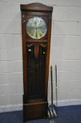 AN EARLY TO MID 20TH CENTURY OAK LONGCASE CLOCK, the full length door enclosing a 11 inch dial,