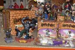 A GROUP OF HARRY POTTER RELATED ITEMS, to include four boxed Enesco 'water balls': Harry Potter,