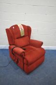 A SHERBOURNE RED UPHOLSTERED ELECTRIC RISE AND RECLINE ARMCHAIR (PAT pass and working) (condition