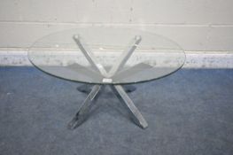 A CIRCULAR GLASS TOP COFFEE TABLE, on a cross frames chrome base diameter 80cm x height 40cm (