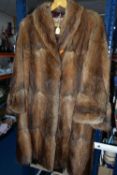 THREE BOXES OF CLOTHING AND SUNDRIES, to include a vintage three quarter length fur coat, a brown