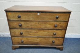 A GEORGIAN WALNUT CHEST OF FOUR LONG GRADUATED DRAWERS, with turned handles on bracket feet,