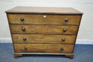 A GEORGIAN WALNUT CHEST OF FOUR LONG GRADUATED DRAWERS, with turned handles on bracket feet,