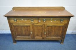 A 20TH CENTURY OAK SIDEBOARD, with a raised back, two drawers, above two cupboard doors, length