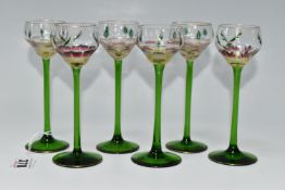 SIX LIQUEUR GLASSES IN THE MANNER OF THERESIENTHAL, comprising six flower form glasses of four