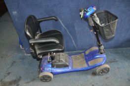 AN UNBRANDED MOBILITY SCOOTER with charger and key (doesn't appear to charge and battery flat)