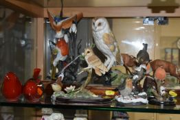 TEN ASSORTED BIRD ORNAMENTS AND A BORDER FINE ARTS GROUP OF TWO STAGS 'HOLDING THE HIGH GROUND'