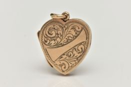 A 9CT GOLD LOCKET, heart form with etched scrolling acanthus detail and a vacant banner style