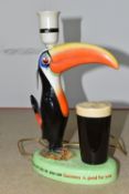 A HAND PAINTED CARLTON WARE GUINNESS ADVERTISING 'TOUCAN' TABLE LAMP, a mid-20th century Guinness