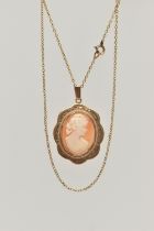 A 9CT GOLD CAMEO PENDANT NECKLACE, oval carved shell cameo, depicting a lady in profile, milgrain