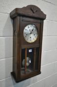 AN EARLY 20TH CENTURY OAK WALL CLOCK, height 76cm (condition report: scuffs and scratches) (two
