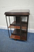 AN EDWARDIAN MAHOGANY REVOLVING BOOKCASE, 50cm squared x height 78cm (condition report: some slats