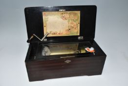 A LATE NINETEENTH CENTURY SWISS MUSIC BOX, with simulated rosewood and ebonised case, plays eight