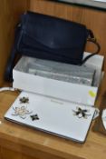 THREE HANDBAGS, comprising a white Michael Kors clutch bag, with three dimensional flower details,