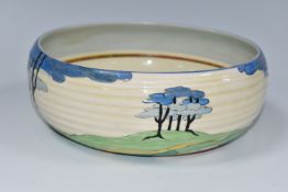 A CLARICE CLIFF 'BLUE FIRS' PATTERN 632 BOWL, painted with stylised blue fir trees in a landscape,