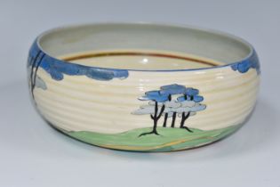 A CLARICE CLIFF 'BLUE FIRS' PATTERN 632 BOWL, painted with stylised blue fir trees in a landscape,