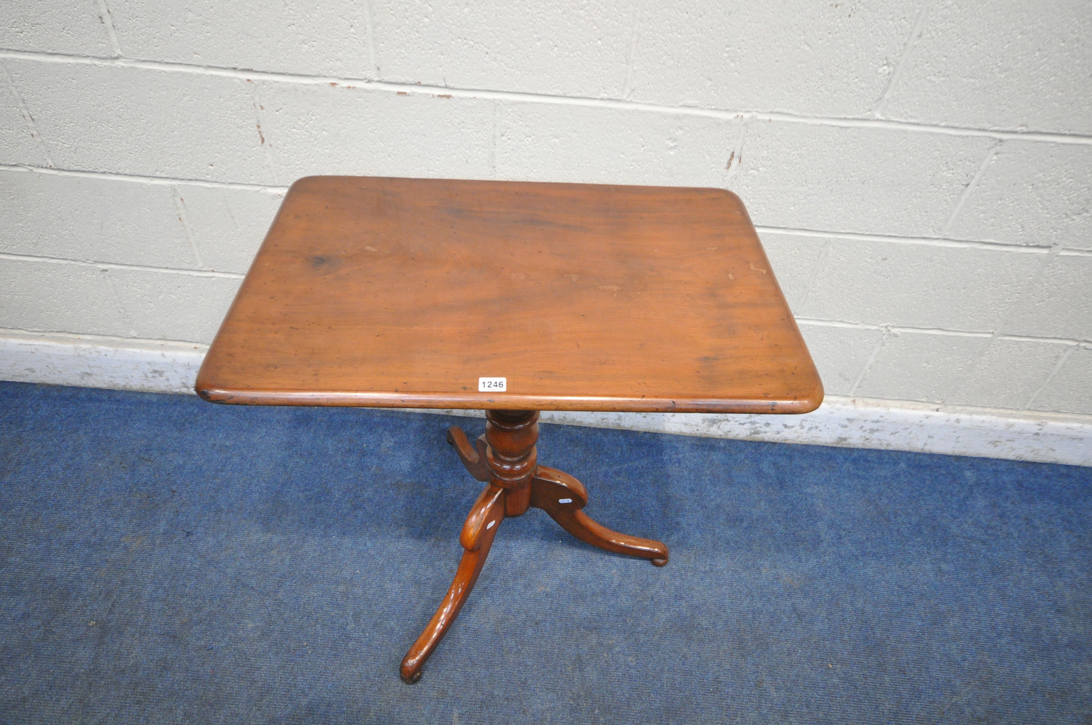 A VICTORIAN MAHOGANY TILT TOP TRIPOD TABLE, raised on a turned support and three shaped legs,