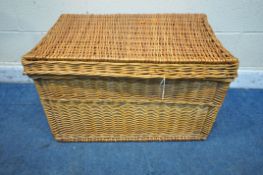 A LARGE WICKER BASKET, with a removable lid and twin handles, width 88cm x depth 54cm x height